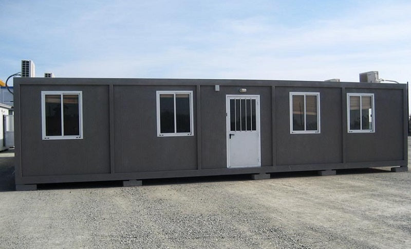 Edificación con corcho proyectado gris oscuro de Isolcork.